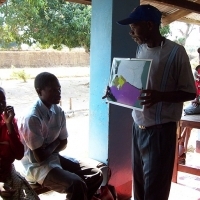 Pregnant women in Zambia receive counseling on sleeping under insecticide-treated bed nets. (Photo courtesy of Jhpiego.) Pregnant women in Zambia receive counseling on sleeping under insecticide-treated bed nets. (Photo courtesy of Jhpiego.)